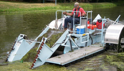 lake equipment in action removing sediment